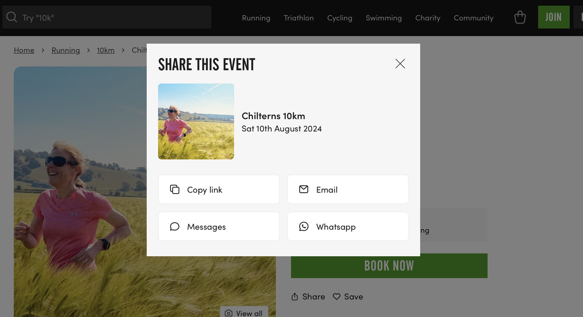 A person wearing a pink shirt and sports sunglasses runs through a field of tall grass, with a blue sky in the background. A popup window titled "SHARE THIS EVENT" displays details for "Chilterns 10km" on Sat 10th August 2024 and sharing options: Copy link, Email, Messages, Whatsapp.