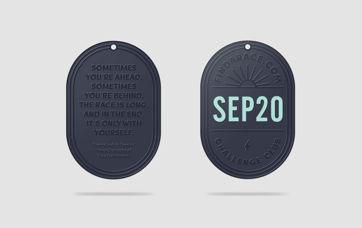 Two navy blue oval tags with a hole at the top. The tag on the left reads "Sometimes you're ahead, sometimes you're behind. The race is long, and in the end, it's only with yourself." The tag on the right has "FINDARACE.COM", "SEP20", and "CHALLENGE CLUB" inscribed.
