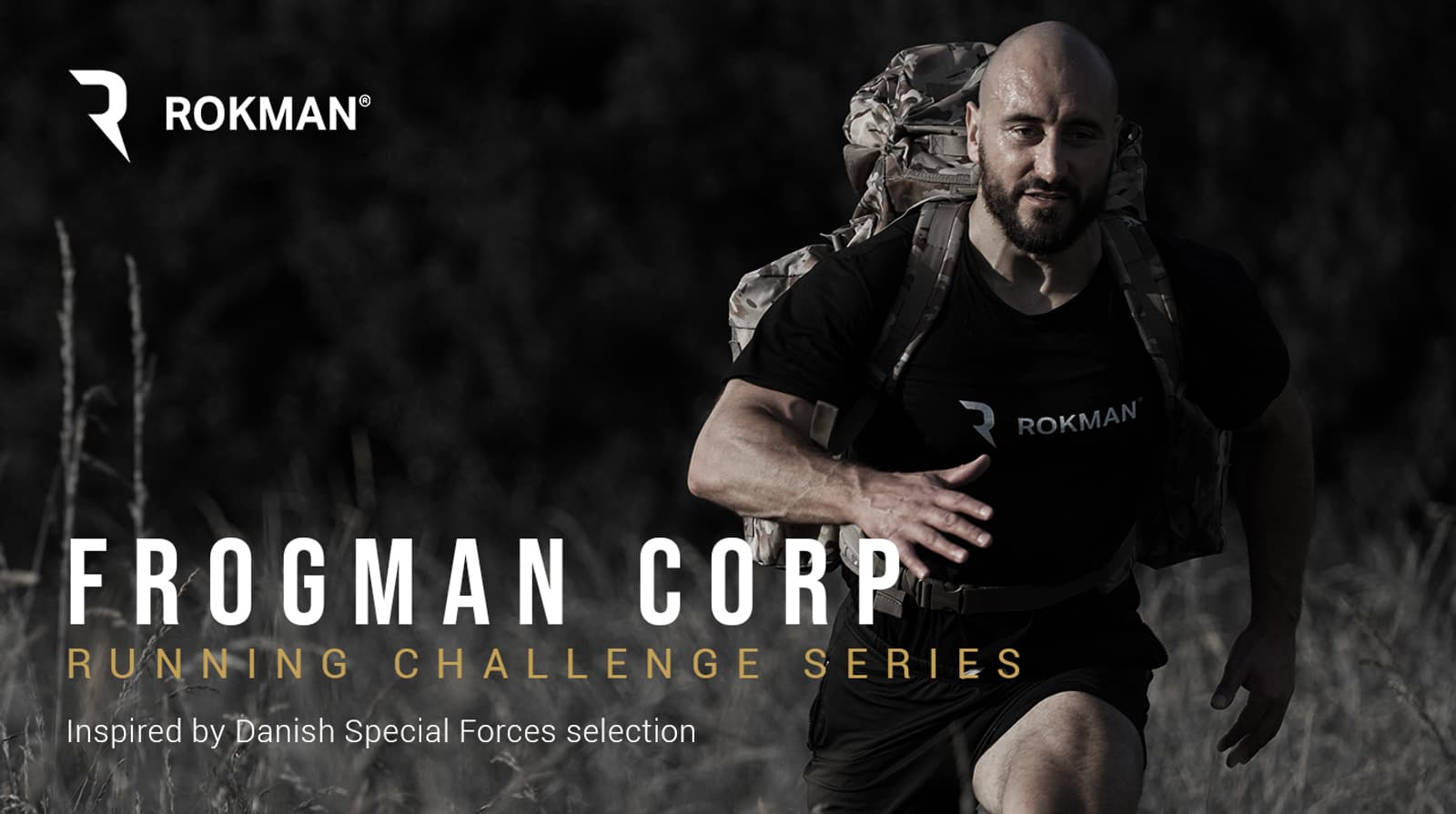 A bald man with a beard, wearing a black Rokman shirt and carrying a backpack, runs through a rugged outdoor landscape. Text on the image reads: "ROKMAN. FROGMAN CORP RUNNING CHALLENGE SERIES. Inspired by Danish Special Forces selection.