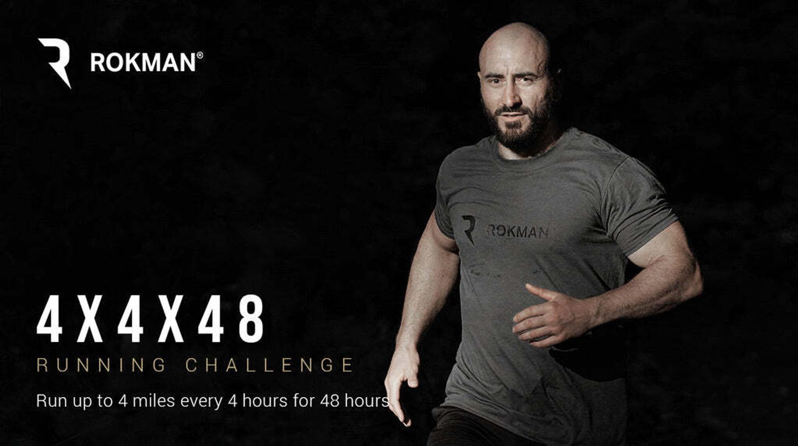 A man with a shaved head and beard is running while wearing a gray t-shirt with the "ROKMAN" logo. The text reads "4X4X48 Running Challenge: Run up to 4 miles every 4 hours for 48 hours." The background is dark, highlighting the runner in the foreground.