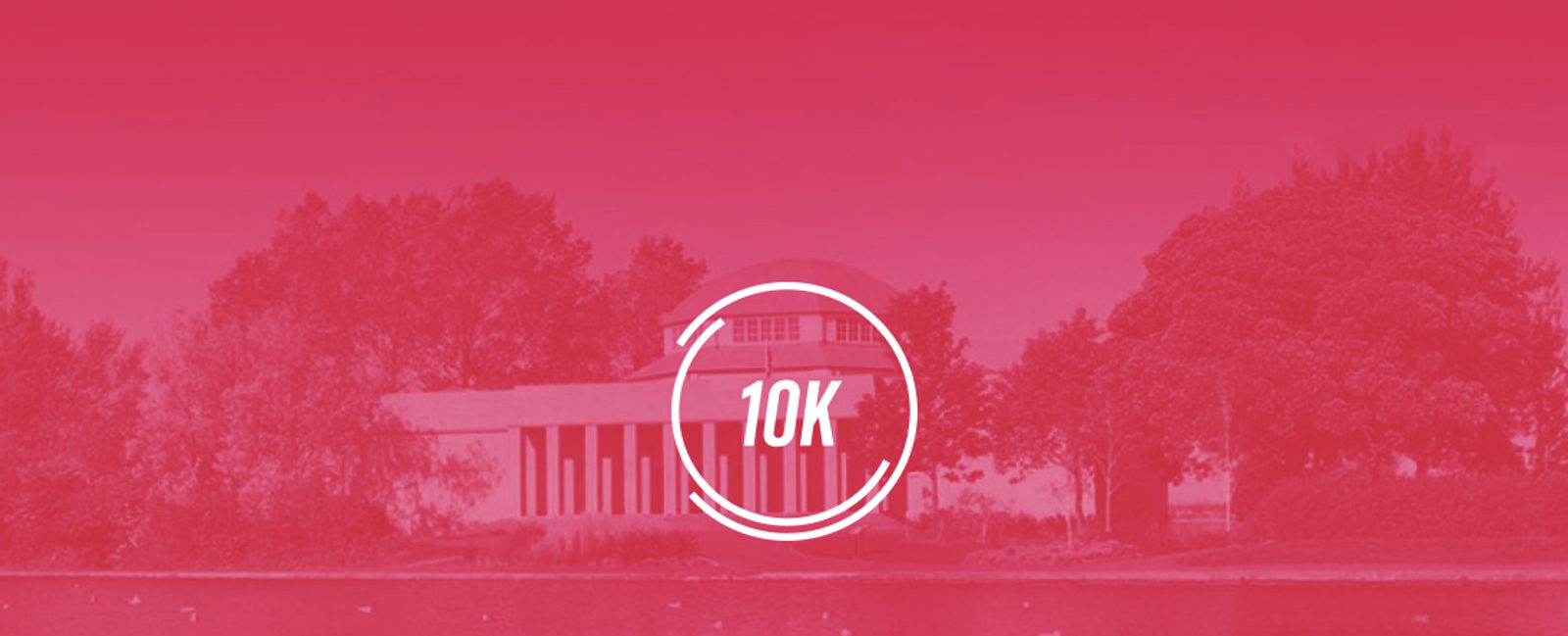 A red tinted image shows a columned building partially obscured by trees next to a body of water. In the foreground, a white circular emblem with "10K" in the center is overlaid on the image.