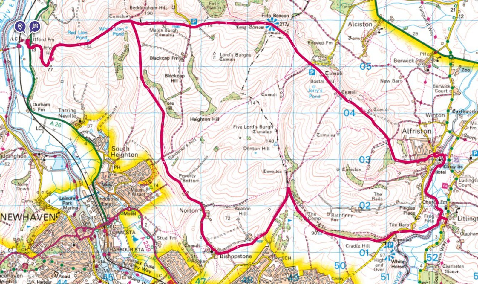 A detailed map outlines a walking route starting from Alfriston, passing through Saddlecombe Road, traversing various trails, hills, and countryside areas, before looping back. Landmarks and terrains, including farms, woodlands, and elevations, are marked along the path.