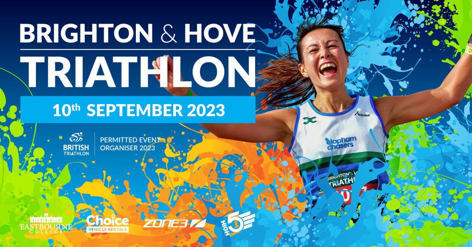 A promotional image for the Brighton & Hove Triathlon on 10th September 2023. It features a joyful athlete celebrating with arms raised against a vibrant background of splashy colors. Logos for British Triathlon, Eastbourne College, Choice Vehicle Rentals, Zone 3, and Active Edge are at the bottom.