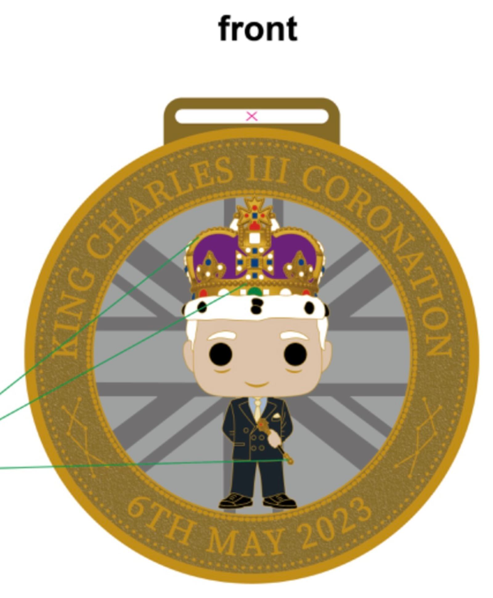 A round commemorative medallion with a cartoon figure of King Charles III wearing a crown and suit. The text around the medallion reads "King Charles III Coronation 6th May 2023." The background has the British flag design.