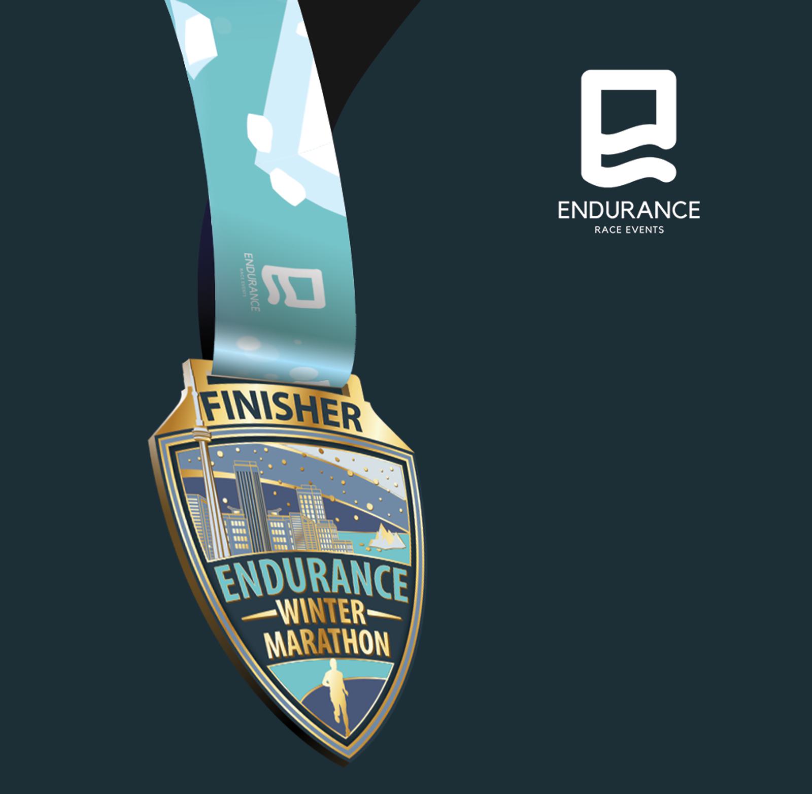 A race medal with "FINISHER" at the top and "ENDURANCE WINTER MARATHON" below an illustration of snowy mountains and a runner. The medal has a blue ribbon and is against a dark background with the Endurance Race Events logo in the top right corner.