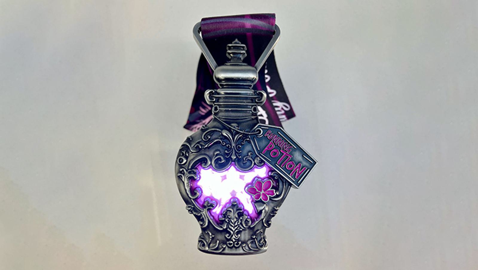 An ornate potion bottle with intricate silver designs and a glowing purple liquid inside. A tag reads "Running Potion!" and it's attached to a decorative ribbon.
