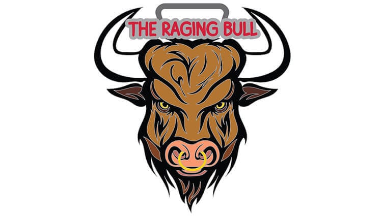 Logo of a fierce brown bull's head with yellow eyes and a nose ring, large horns, and the text "THE RAGING BULL" in bold red letters above its head.