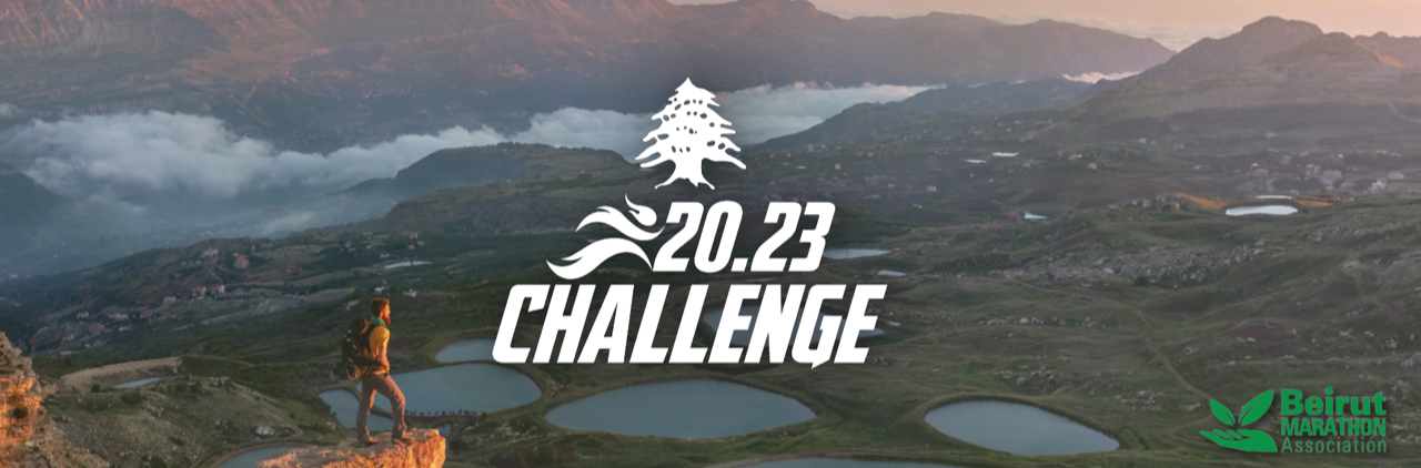 A hiker stands on a rocky ledge overlooking a breathtaking mountainous landscape with several serene lakes. Overlaid text reads "20.23 Challenge" with a tree and wave motif. The Beirut Marathon Association logo appears in the bottom right corner.