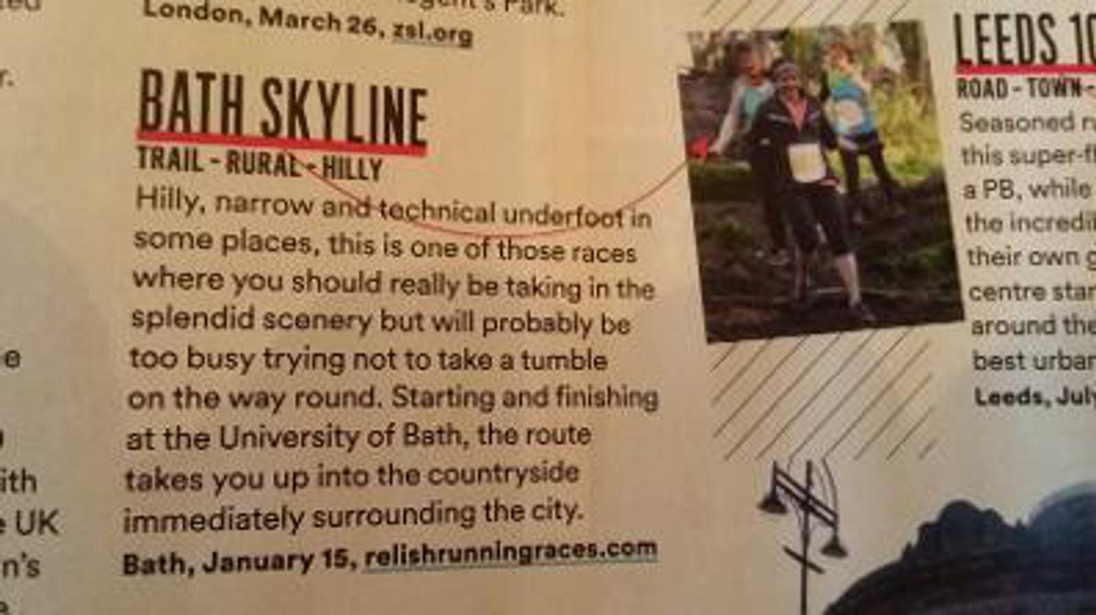Image of a magazine page featuring an event titled "Bath Skyline." The description below reads: "Hilly, narrow, and technical underfoot in some places, this is one of those races where you should really be taking in the splendid scenery but will probably be too busy trying not to take a tumble on the way round." Information follows about the race's starting and finishing points at the University of Bath, and the event date of January 15.