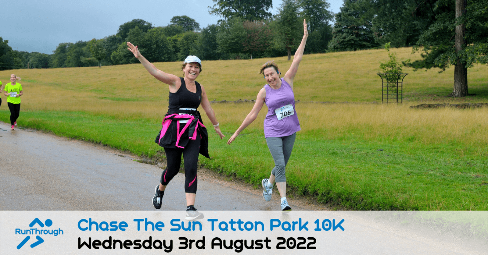 Two women in athletic wear smile and raise their arms as they run on a path in a grassy park during a 10K race. A runner is behind them. Text reads: "Chase The Sun Tatton Park 10K, Wednesday 3rd August 2022.
