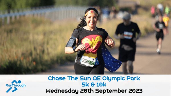 A woman wearing a Wonder Woman costume is running in a race at the "Chase The Sun QE Olympic Park 5k & 10k" event. She is smiling, with her hair tied back. The event details and date, "Wednesday 20th September 2023," are displayed at the bottom of the image.