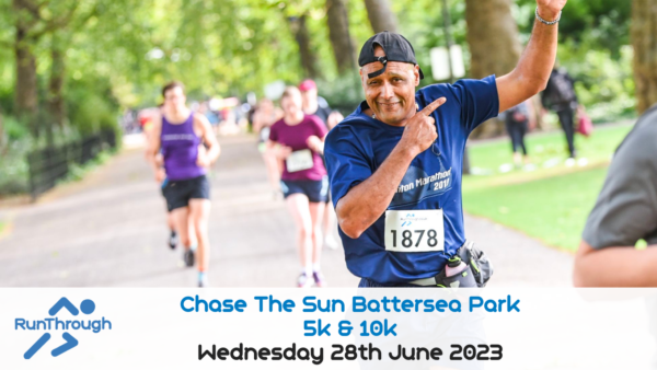 A man wearing a blue "RunThrough" shirt and cap smiles and points while running during the Chase The Sun Battersea Park 5k & 10k event. Other runners and trees are visible in the background. Text at the bottom reads "Wednesday 28th June 2023.