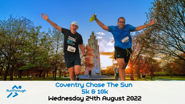 Two runners are celebrating as they cross the finish line of the Coventry Chase The Sun 5k & 10k race, held on Wednesday, August 24th, 2022. Both are smiling, with one raising an arm in victory, set against a backdrop of trees and a monument.