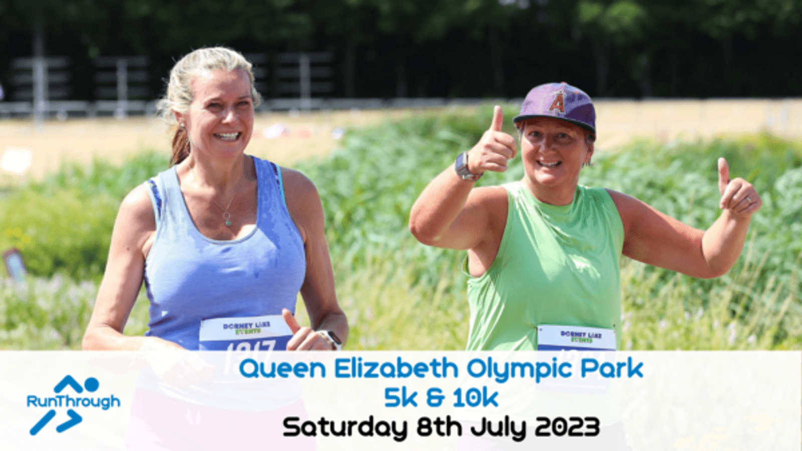 Two women are running outdoors on a sunny day, both smiling. One is wearing a blue tank top, while the other is in a green tank top and giving a thumbs-up. A banner at the bottom reads, "Queen Elizabeth Olympic Park 5k & 10k, Saturday 8th July 2023.