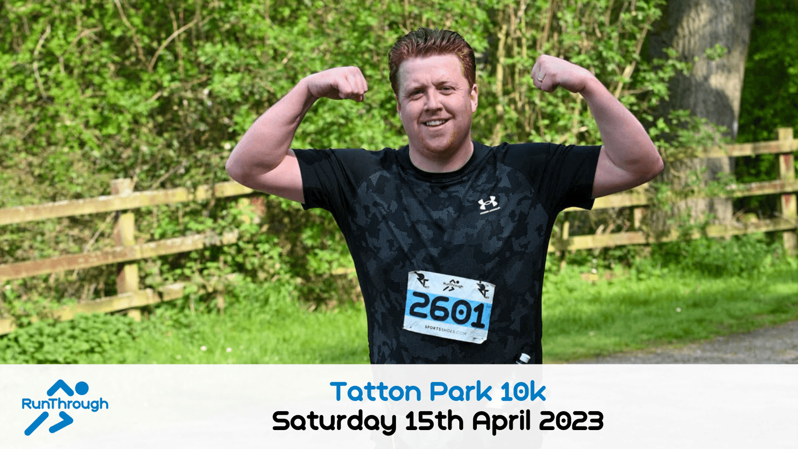 A smiling man poses with flexed arms after a run, wearing a race bib numbered 2601. Text below reads "Tatton Park 10k, Saturday 15th April 2023" with the RunThrough logo. Trees and a wooden fence are in the background.