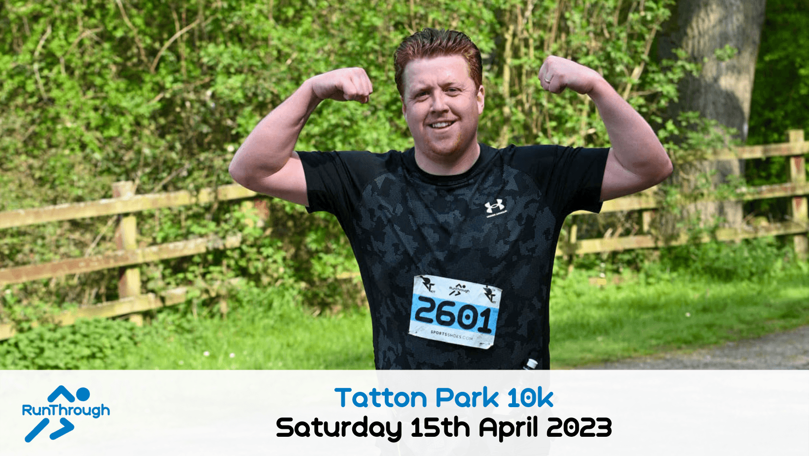 A smiling man poses with flexed arms after a run, wearing a race bib numbered 2601. Text below reads "Tatton Park 10k, Saturday 15th April 2023" with the RunThrough logo. Trees and a wooden fence are in the background.