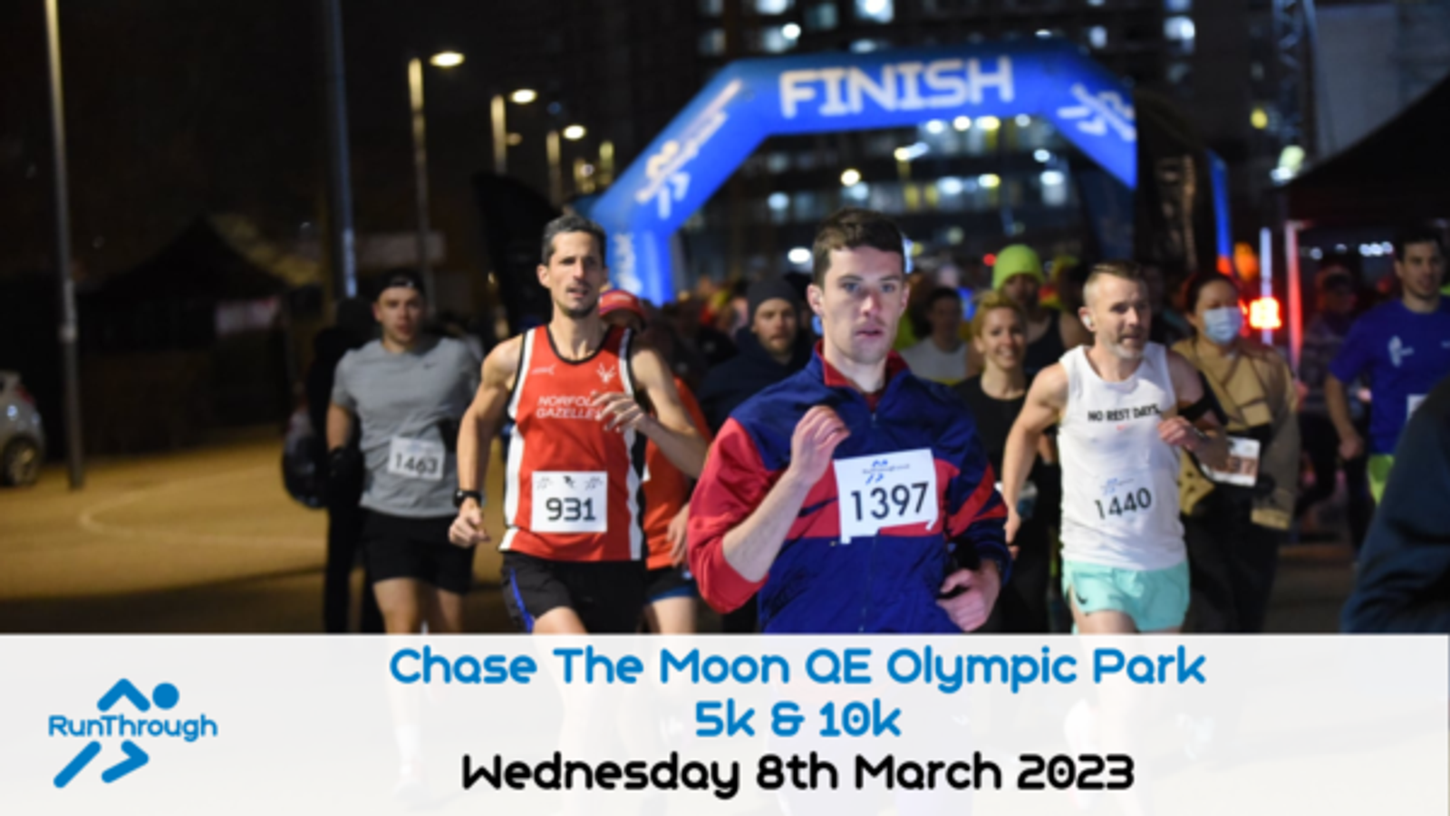 Runners in a race are approaching the finish line at night. A blue banner with "FINISH" is visible overhead. The event is titled "Chase The Moon QE Olympic Park 5k & 10k" and is dated "Wednesday 8th March 2023." The RunThrough logo is in the bottom left corner.