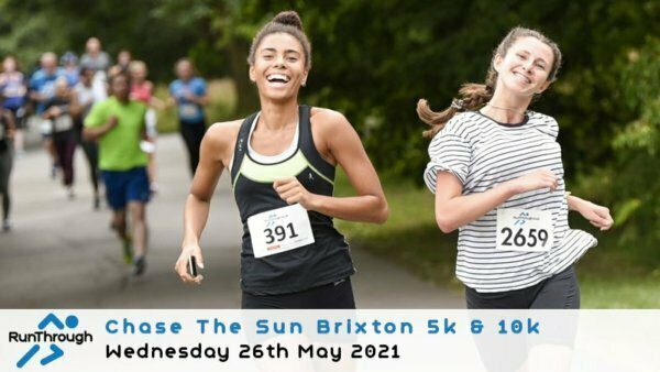 Two female runners, wearing race bibs 391 and 2659, smile as they run along a path with several other participants in the background. The bottom of the image has text stating "RunThrough Chase The Sun Brixton 5k & 10k, Wednesday 26th May 2021.