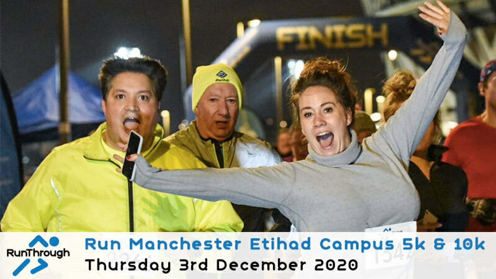 A group of excited runners in bright athletic gear celebrate after crossing the finish line at the Run Manchester Etihad Campus 5k & 10k event. The image features the event details on a banner: "Thursday 3rd December 2020.