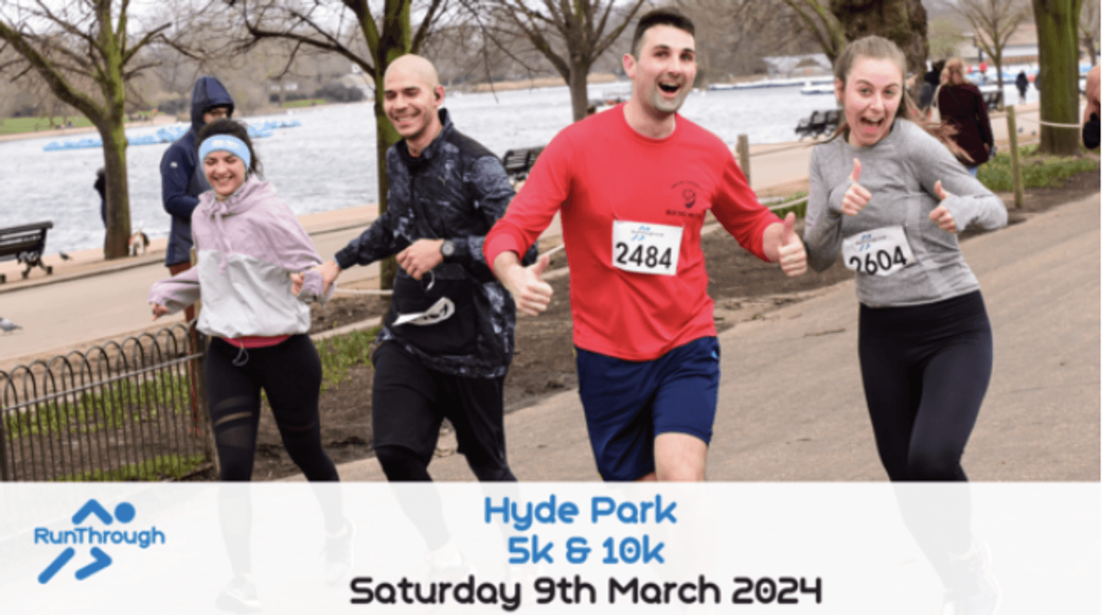 Four runners, wearing numbered bibs, smile and give thumbs-ups during a race in Hyde Park. They run alongside a lake on a paved path with park benches and a few other runners in the background. Text at the bottom reads "Hyde Park 5k & 10k, Saturday 9th March 2024.