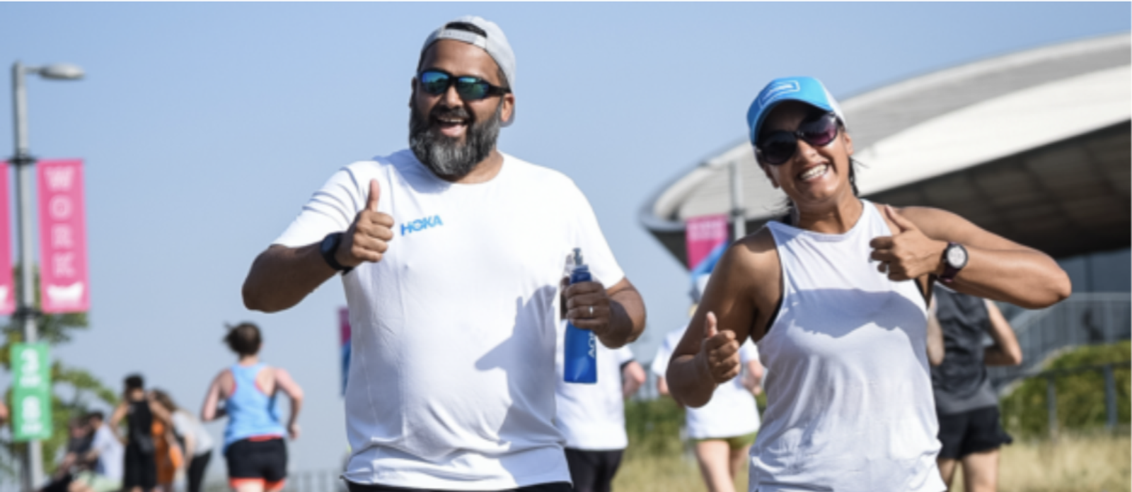 A man and woman running.