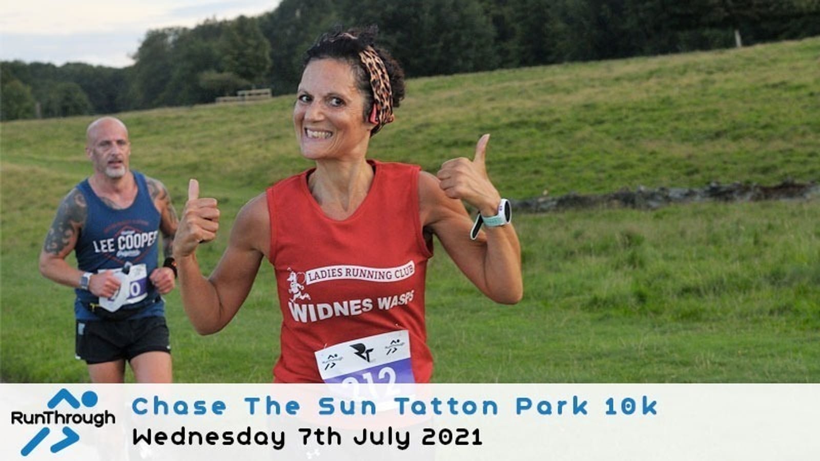 A runner wearing a red "Widnes Wasps" top smiles and gives two thumbs up during the Chase The Sun Tatton Park 10k event on July 7th, 2021. Another runner is seen in the background. The event banner is at the bottom of the image.