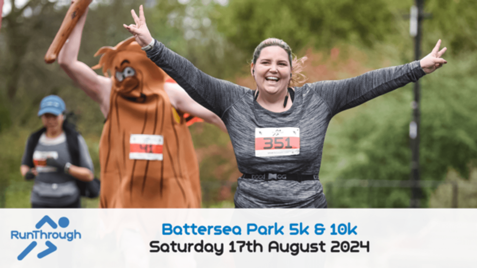 A joyful woman wearing a race bib number 351 runs with her arms outstretched. Behind her, another participant in a humorous food costume also runs. Text at the bottom reads "Battersea Park 5k & 10k, Saturday 17th August 2024," accompanied by the RunThrough logo.