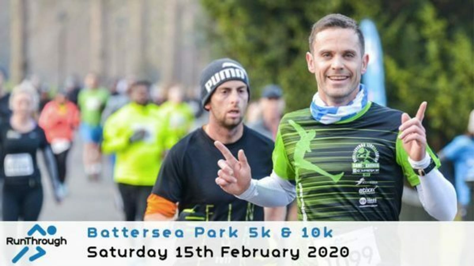 Runners participating in the Battersea Park 5k & 10k event are shown, with one runner in a black and green outfit and another in a black and orange outfit. The text on the image reads: "RunThrough, Battersea Park 5k & 10k, Saturday 15th February 2020.