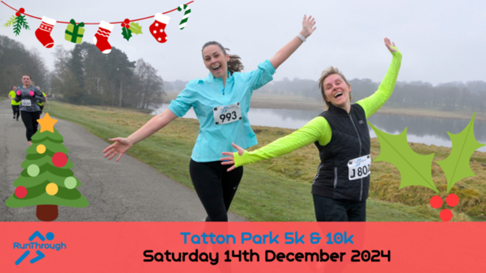 Two women are joyfully running with their arms raised, each wearing a numbered running bib. The background shows a misty parkland with a lake. Festive graphics, including a Christmas tree, stockings, and holly, adorn the image. The text reads: "Tatton Park 5k & 10k, Saturday 14th December 2024." The RunThrough logo is also visible.