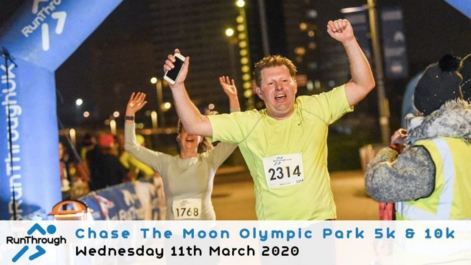 A man with race bib number 2314 triumphantly crosses the finish line with his arms raised. Other participants are visible behind him. Above is an arch with "RunThrough" logos. Text at the bottom reads, "Chase The Moon Olympic Park 5k & 10k, Wednesday 11th March 2020.