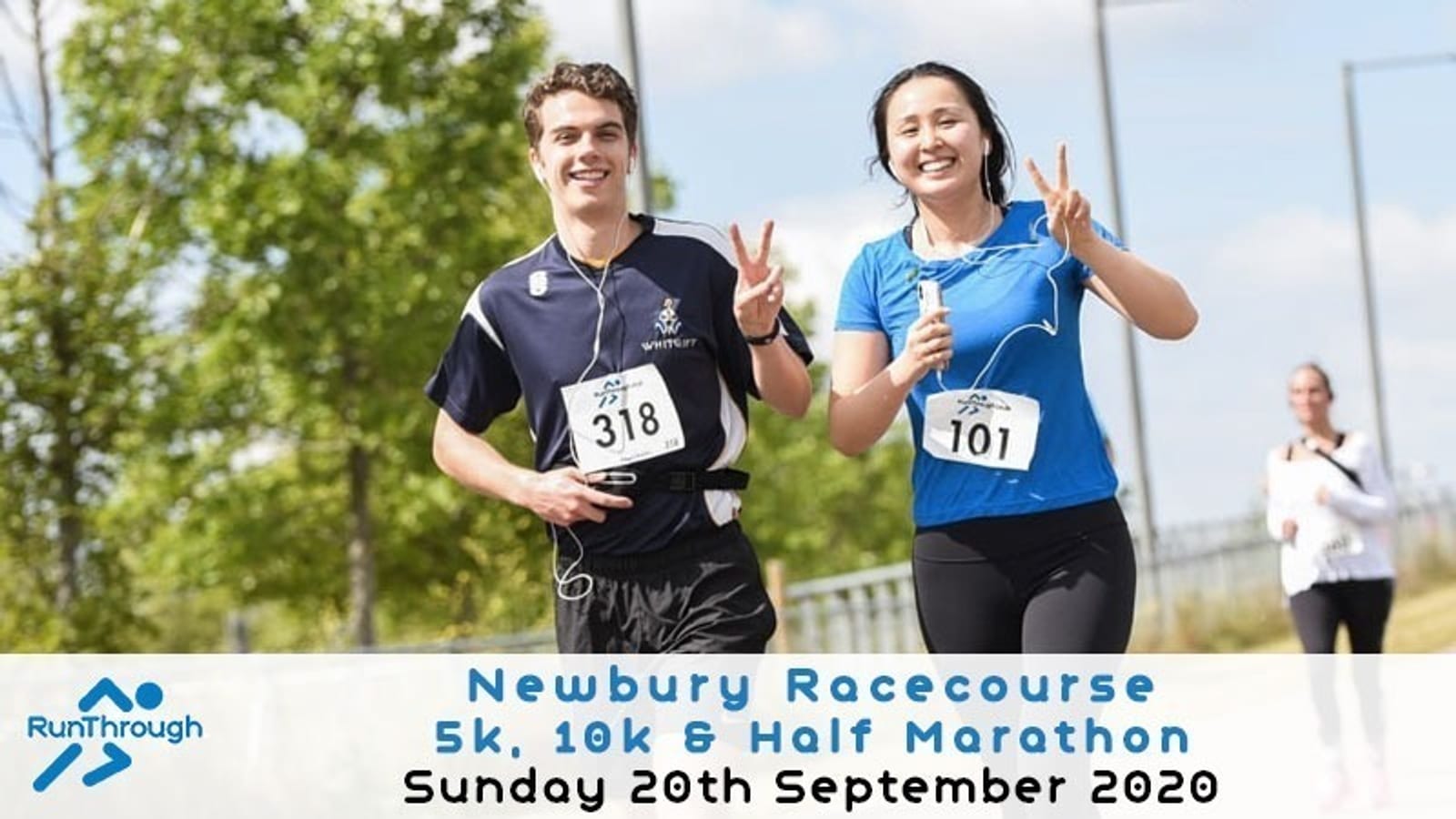Two runners, a man and a woman, smiling and making peace signs as they run at the Newbury Racecourse 5k, 10k, and Half Marathon. Both wear race bibs and earphones. Event details and date (Sunday 20th September 2020) are visible at the bottom along with the RunThrough logo.