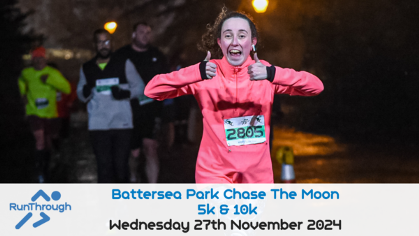 A woman in a bright pink outfit runs a nighttime race, smiling and giving two thumbs up. She has the number 2605 on her bib. Other runners are visible in the background. Text at the bottom reads, "Battersea Park Chase The Moon 5k & 10k, Wednesday 27th November 2024.