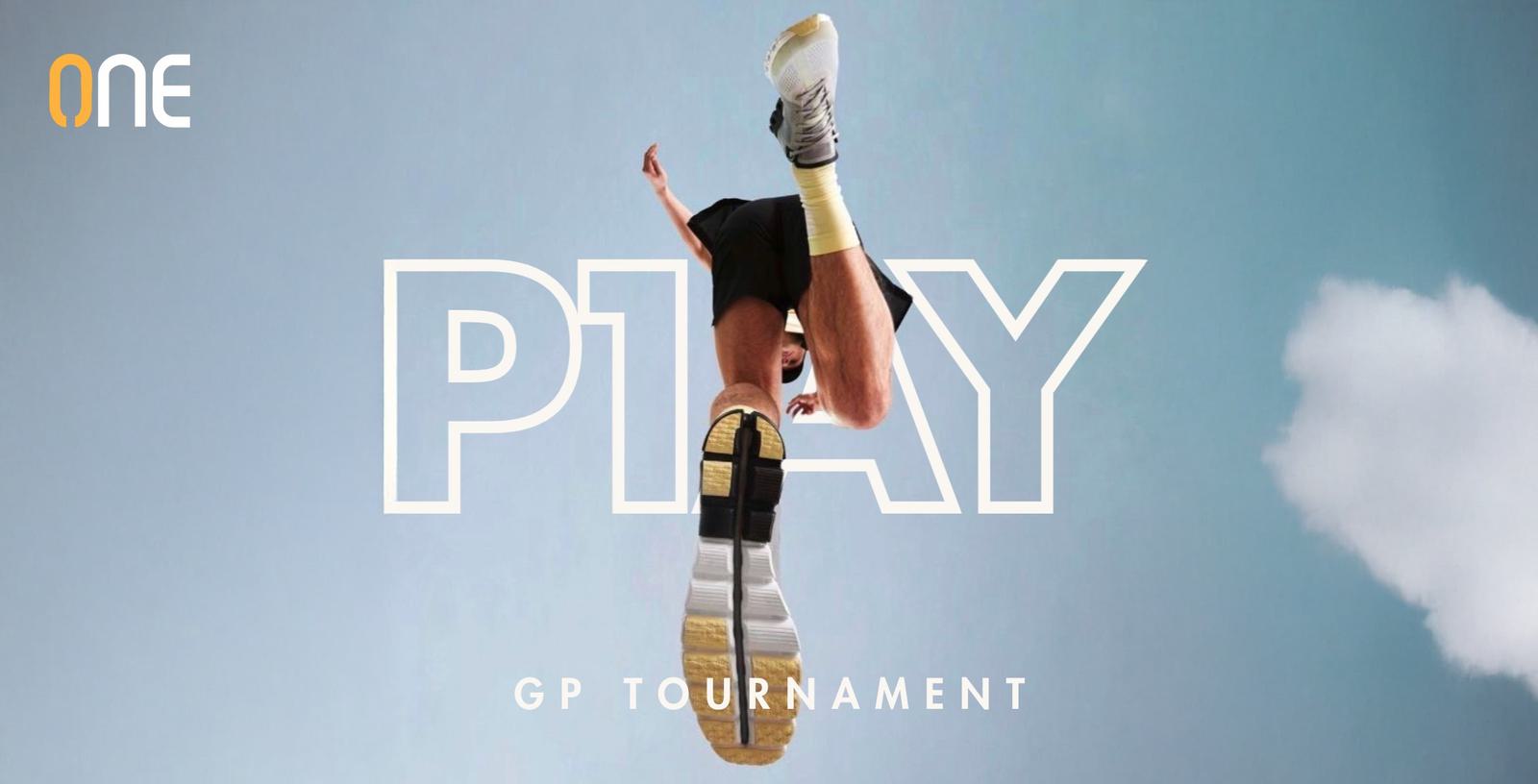 Low angle view of a person jumping against a blue sky, with the word "PLAY" in large letters. The sole of the person's athletic shoe is visible, and the text "GP TOURNAMENT" is below. The logo "ONE" is in the top left corner.