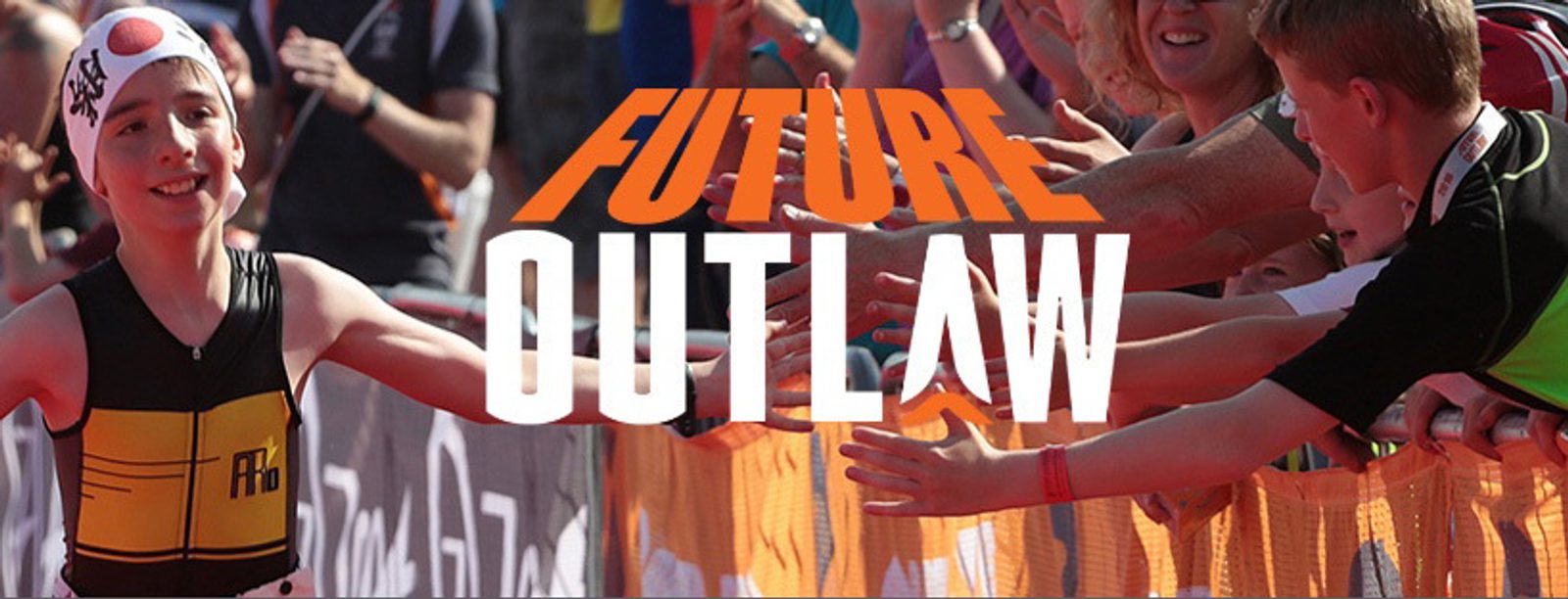 A young athlete wearing a swim cap and triathlon outfit reaches the finish line while smiling. Several people extend their hands for high-fives. The words "FUTURE OUTLAW" are prominently displayed over the image.