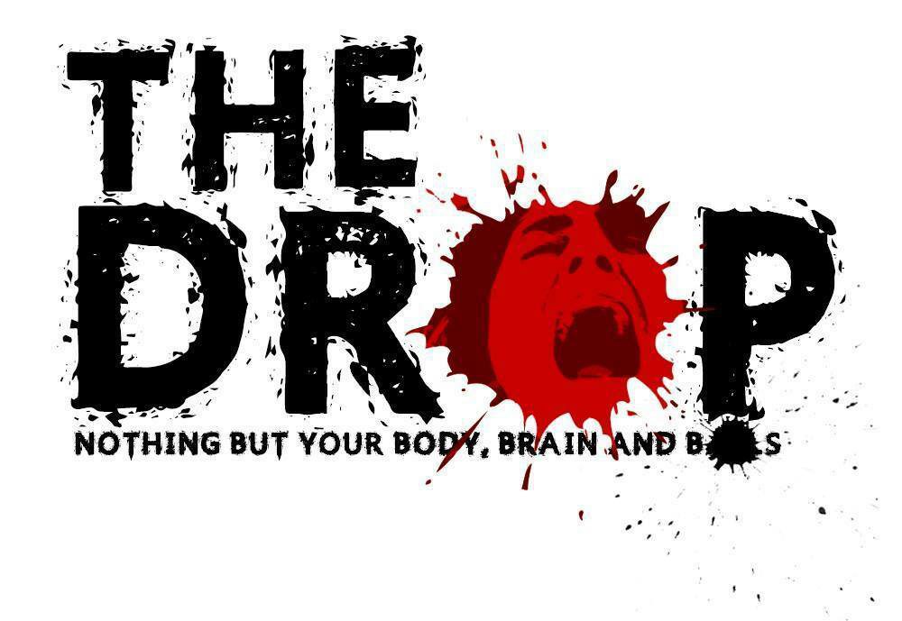 The image has the text "THE DROP" with a distressed, splattered paint style. The "R" in "DROP" has a red splatter with a screaming face inside. Below, it reads, "NOTHING BUT YOUR BODY, BRAIN AND BONES." The background is white.