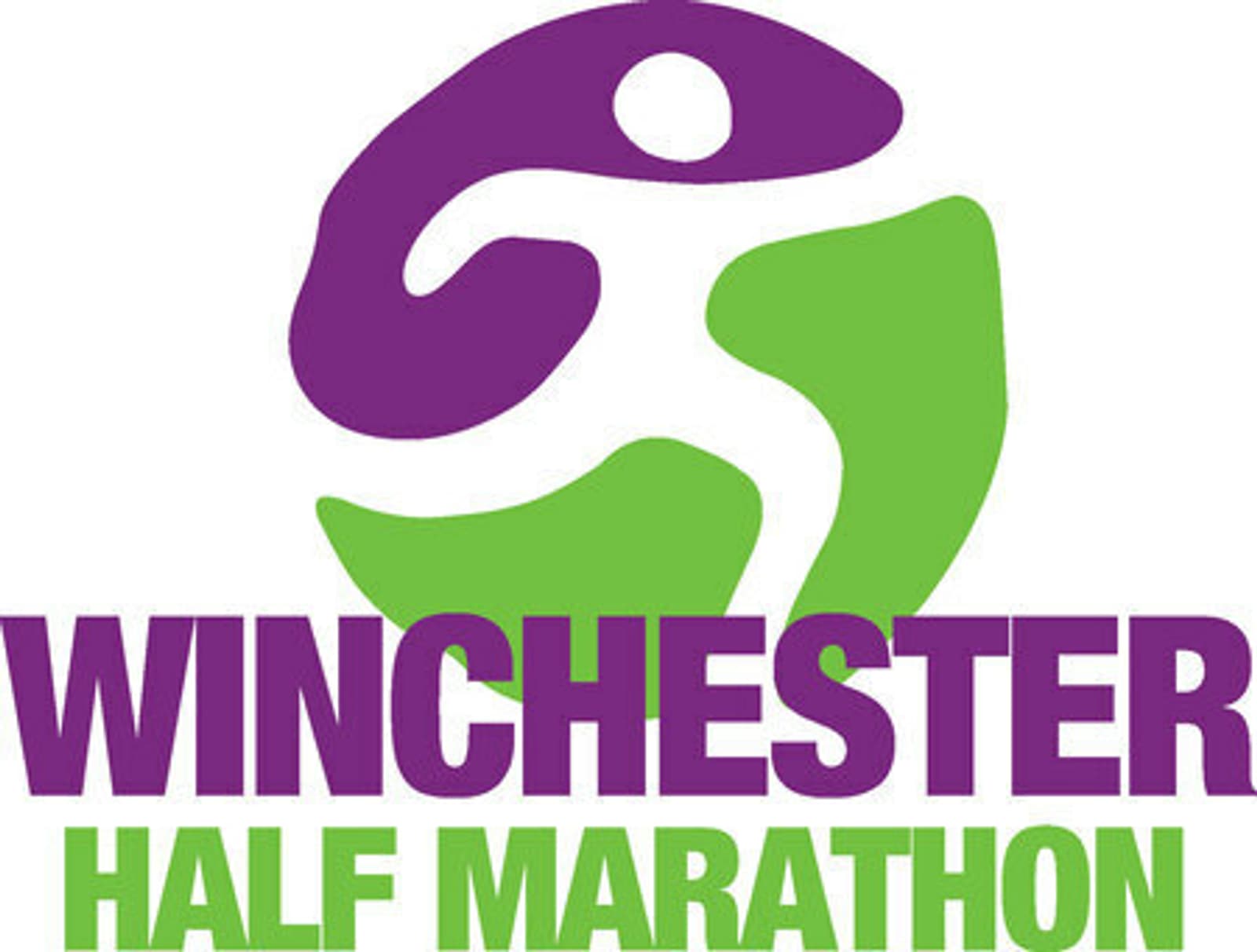 Logo for the Winchester Half Marathon with a stylized purple figure running over a green abstract shape, accompanied by the text "Winchester Half Marathon" in bold purple and green letters.