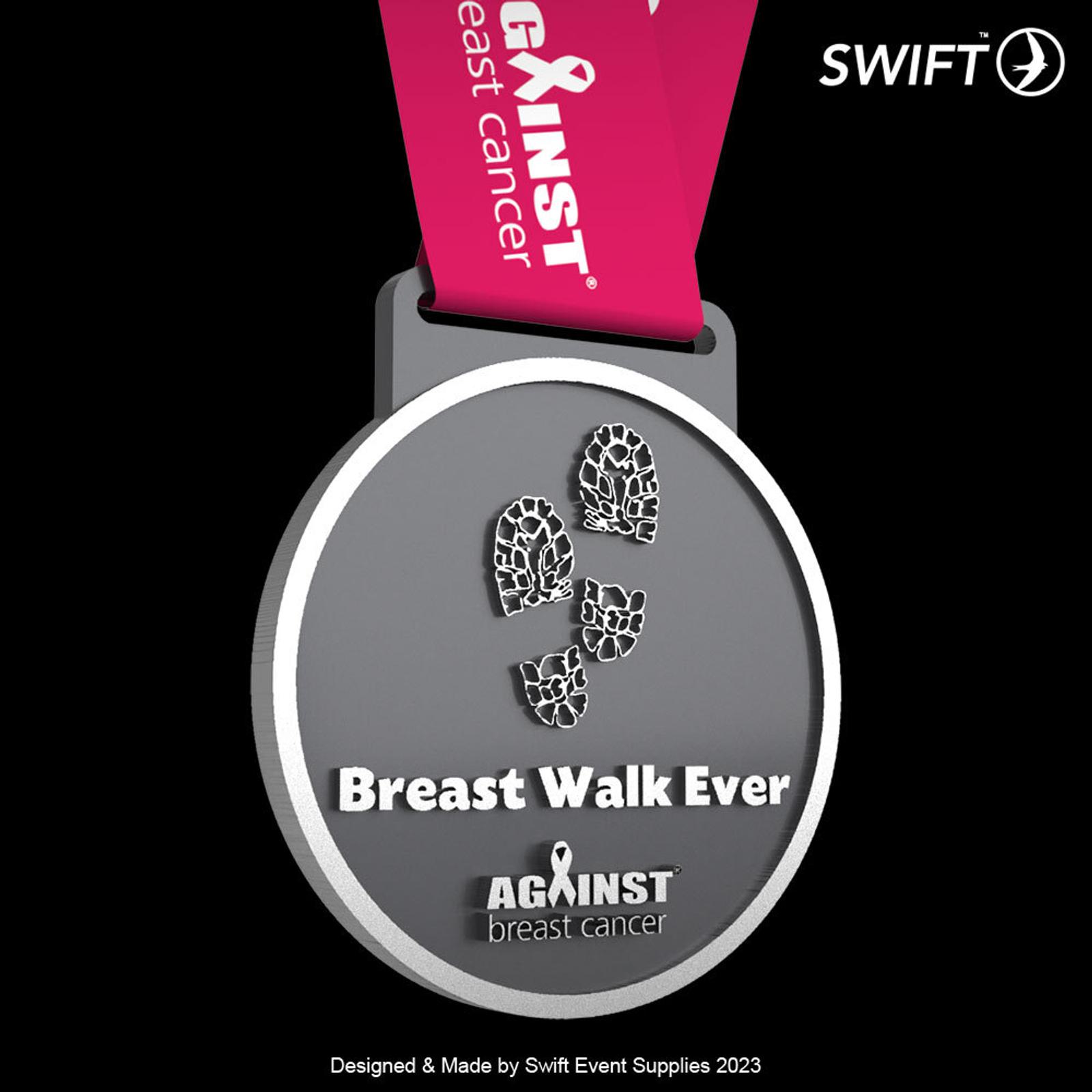 A gray medal with an imprinted design of three shoe prints and the text "Breast Walk Ever" and "Against breast cancer". The medal has a pink ribbon attached with the words "Against breast cancer". The Swift logo is visible in the top right corner.