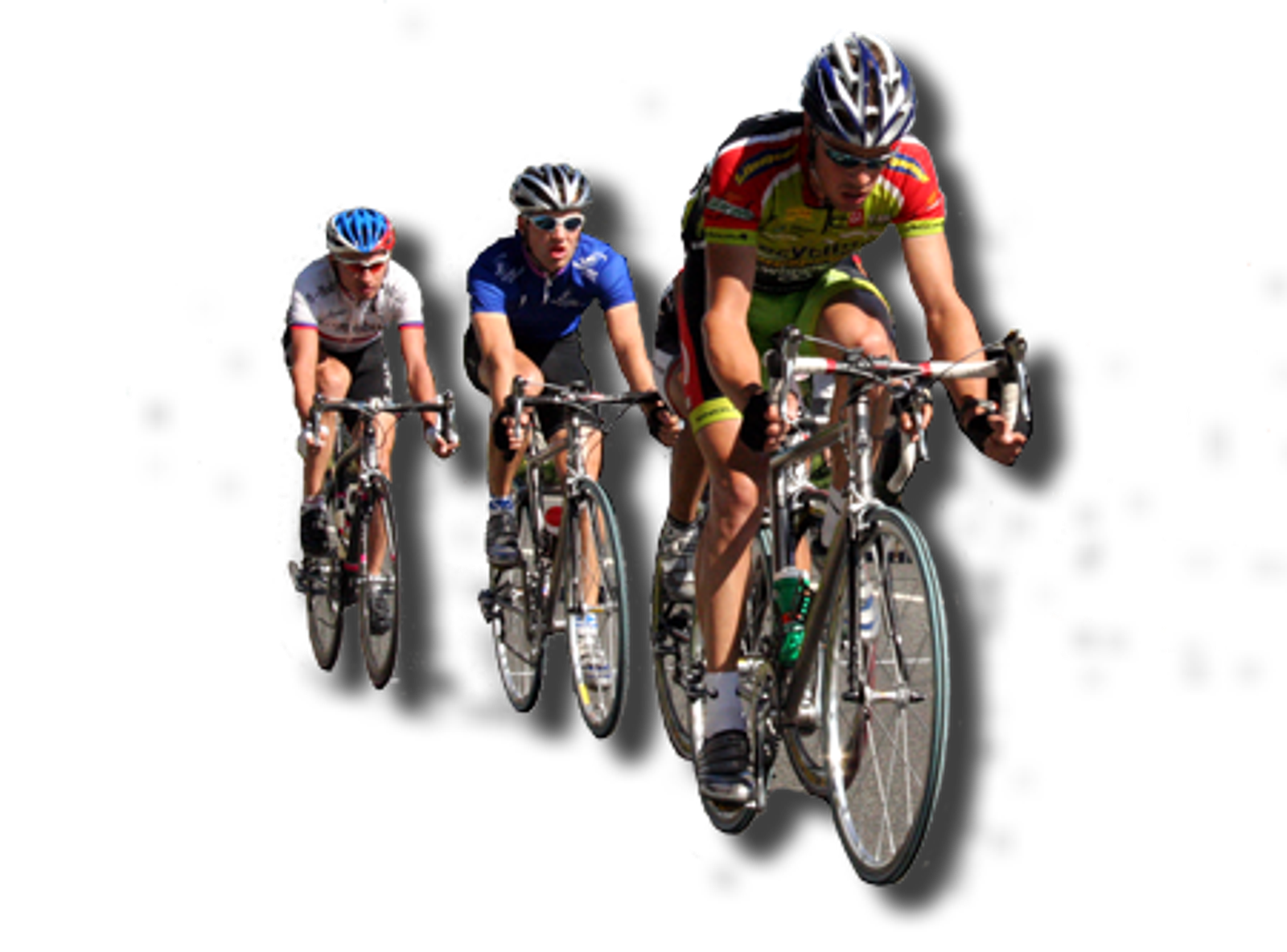 Three cyclists wearing helmets and racing attire are riding closely in a line on road bikes. The leading cyclist is dressed in a red, white, and green outfit, followed by a rider in a blue outfit, and the third cyclist is in a white and red outfit.