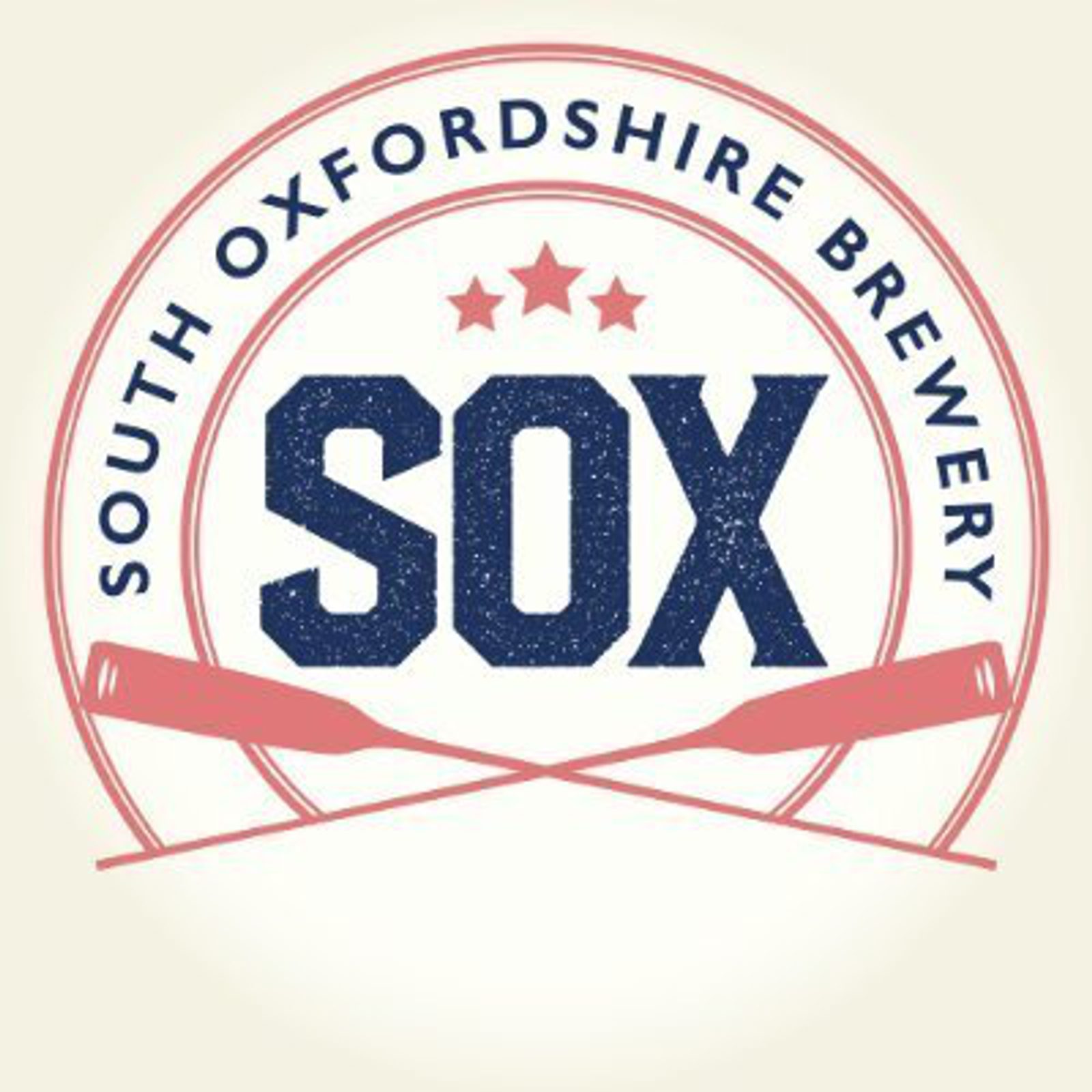 Logo of South Oxfordshire Brewery featuring a large stylized "SOX" in blue at the center. Above the text are three red stars, and below are red oars crossing each other. The text "South Oxfordshire Brewery" curves around the top half of the design.