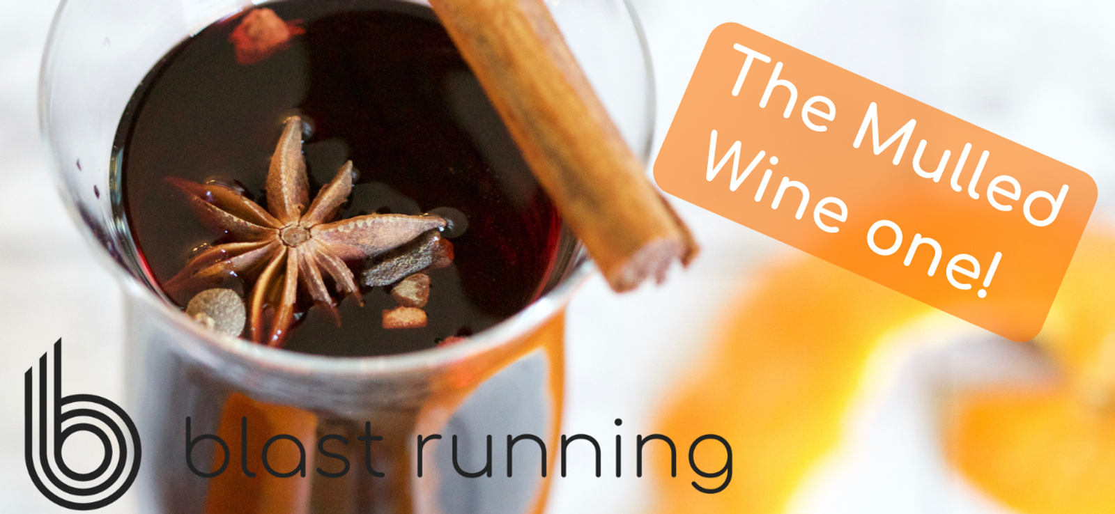 A glass of mulled wine garnished with a cinnamon stick and star anise, with the text "The Mulled Wine one!" on an orange background. The "blast running" logo is visible at the bottom left corner of the image.
