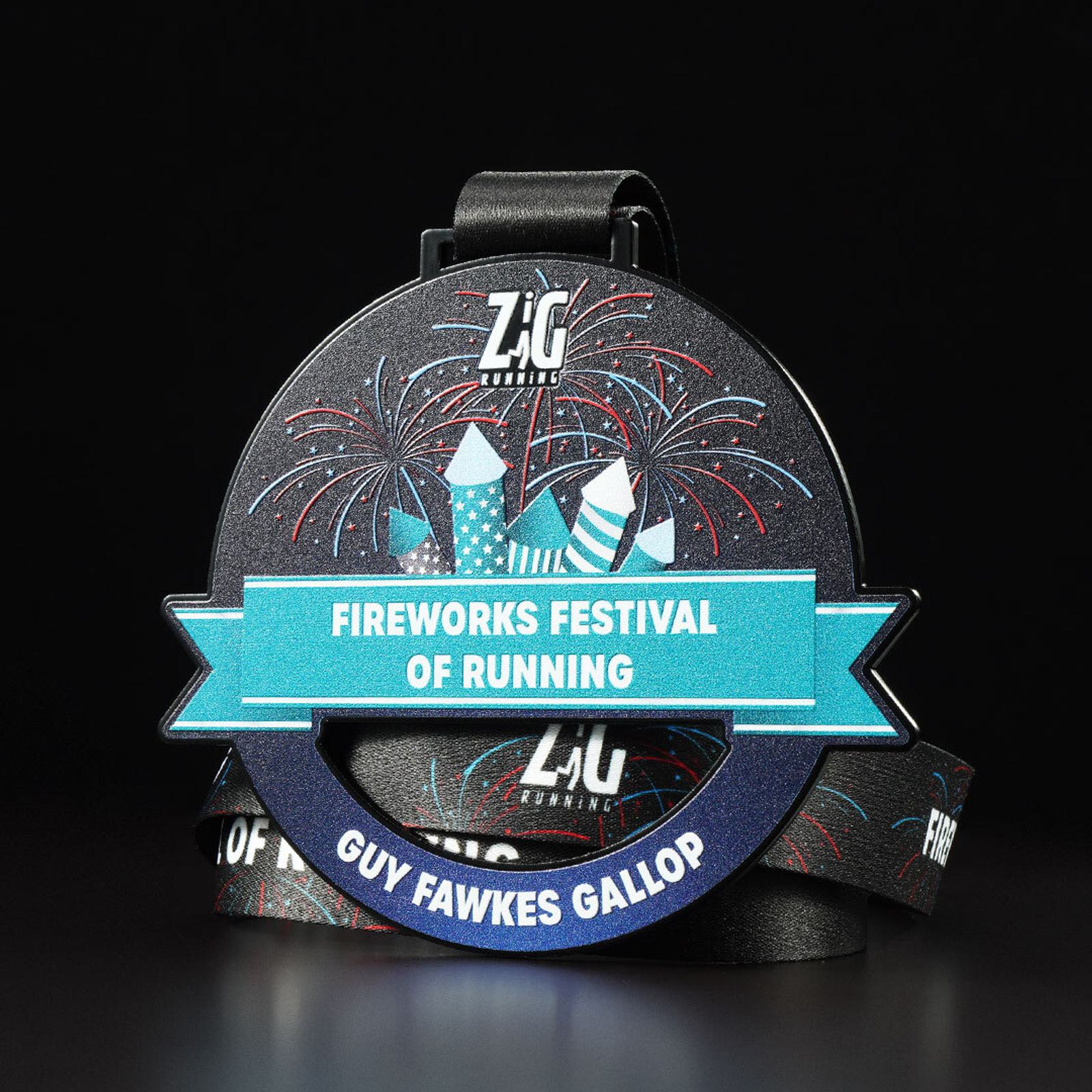 A circular medal with fireworks and a blue banner displaying "FIREWORKS FESTIVAL OF RUNNING". The text "Guy Fawkes Gallop" is at the bottom. The medal is attached to a black ribbon with the logo "Zig Running" on top and fireworks illustrations.