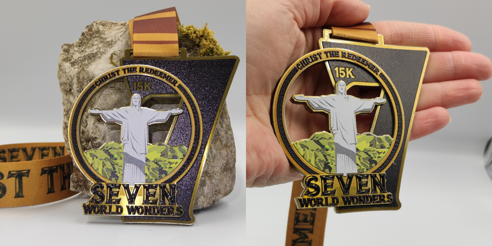 An image shows a medal for a 15K race. The medal features "Christ the Redeemer," with the text "15K" above the statue, "SEVEN WORLD WONDERS" below the statue and on the ribbon. One view shows the medal held by a hand, the other displayed on a rock.
