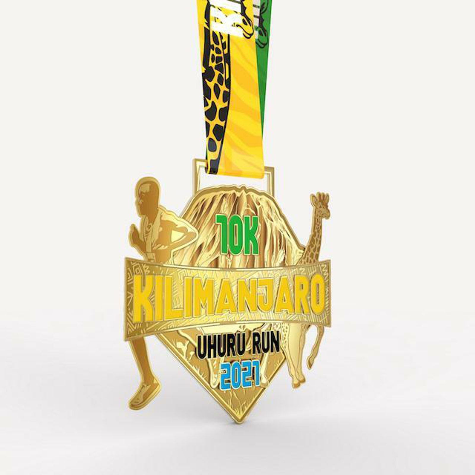 A gold medal with a ribbon showcasing "10K Kilimanjaro Uhuru Run 2021". The medal features an image of a runner, a giraffe, and Mount Kilimanjaro. The ribbon has a vibrant design with shades of green, yellow, and black, and includes a pattern resembling a giraffe's spots.