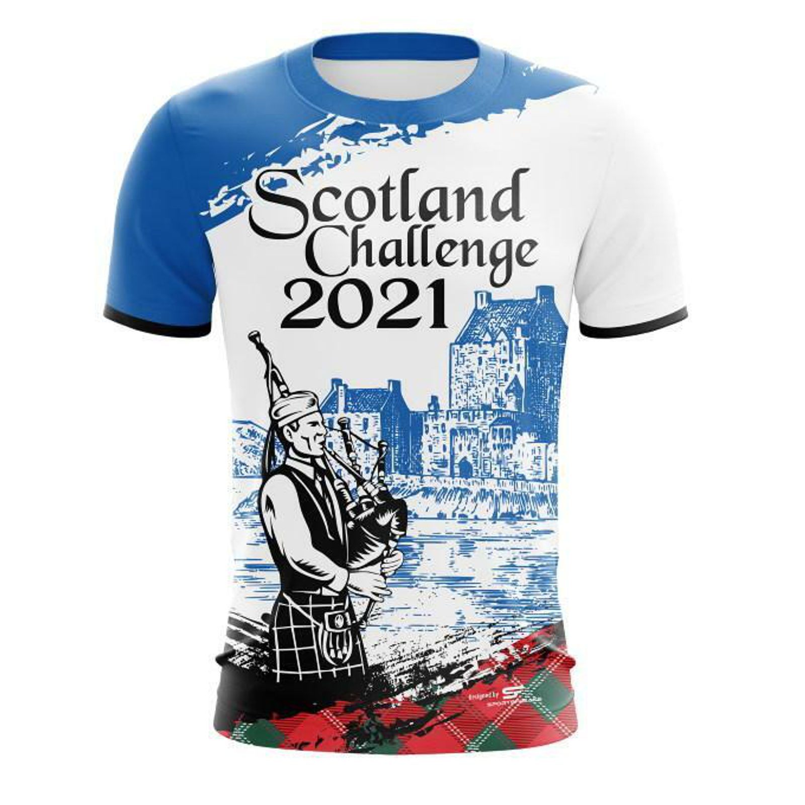 A white and blue t-shirt featuring "Scotland Challenge 2021" text. The design includes an illustration of a bagpiper in traditional attire, with a scenic backdrop of a castle and a water body. The bottom edge has a tartan pattern accent.
