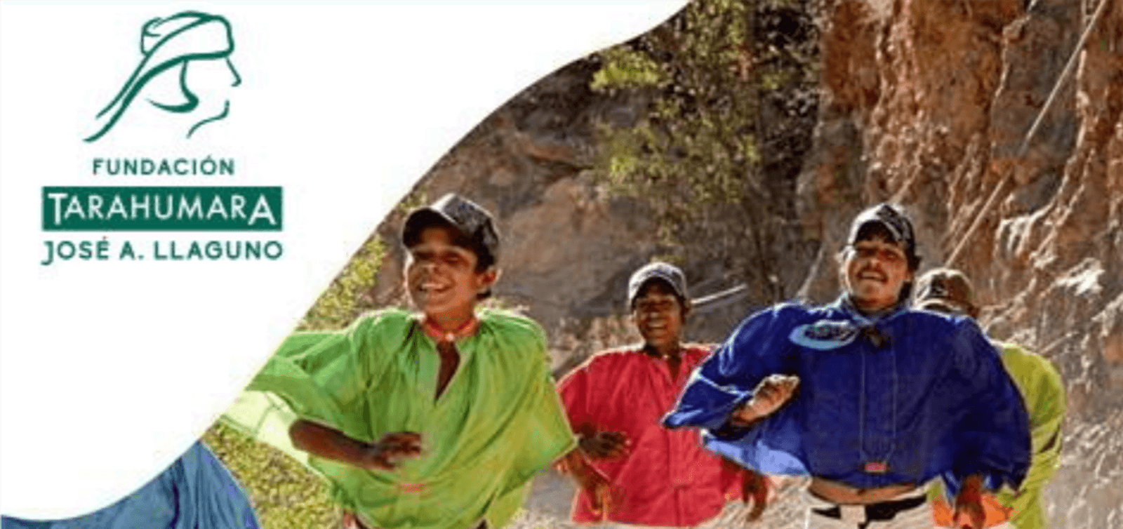 Four people are running outdoors in a rugged landscape, wearing colorful traditional clothing. The Fundación Tarahumara José A. Llaguno logo is visible in the top left corner. They appear joyful and are engaged in what looks like a cultural or community event.