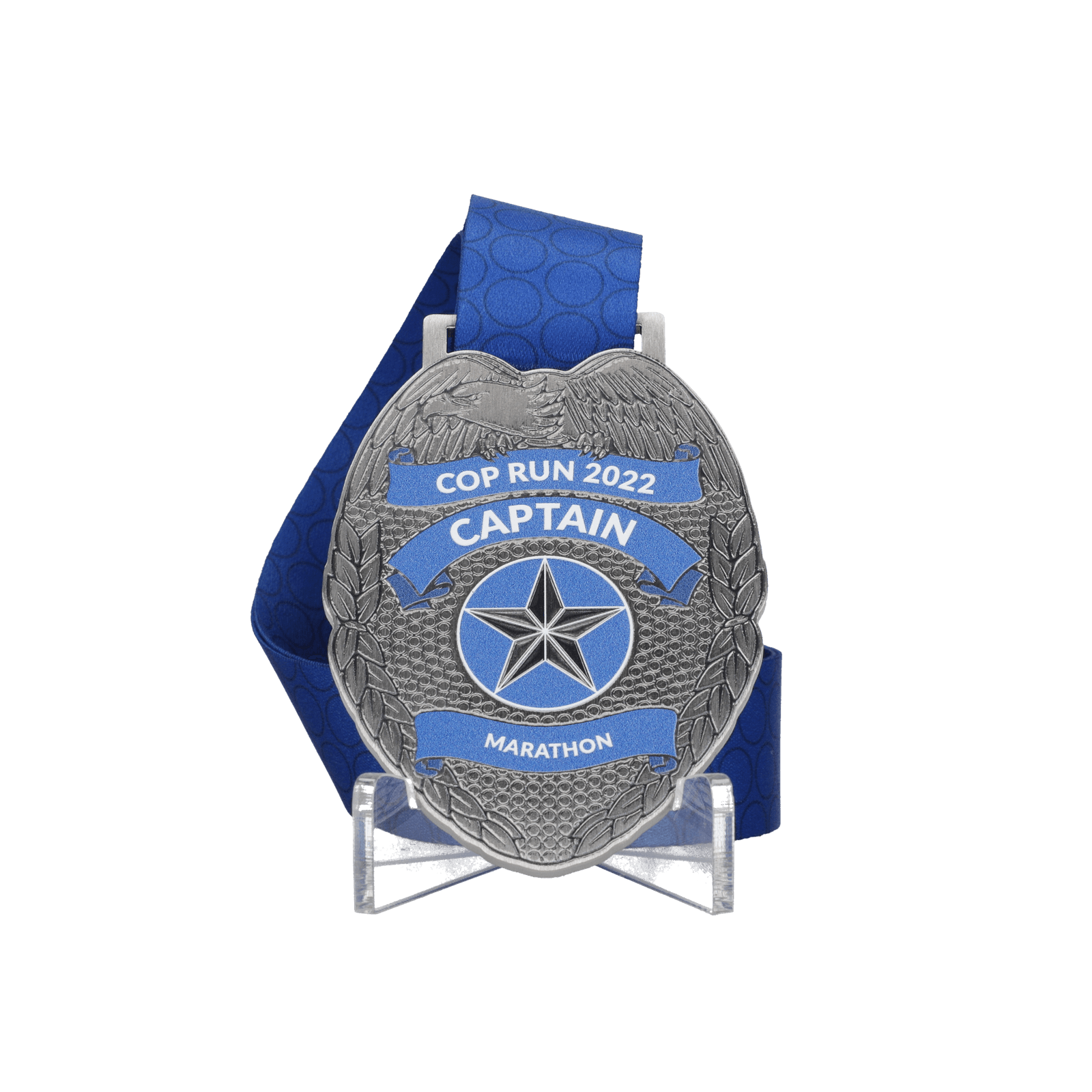 A silver medal shaped like a police badge with a blue ribbon. It reads "Cop Run 2022 Captain Marathon" and features a star at the center. The ribbon has a circular pattern.