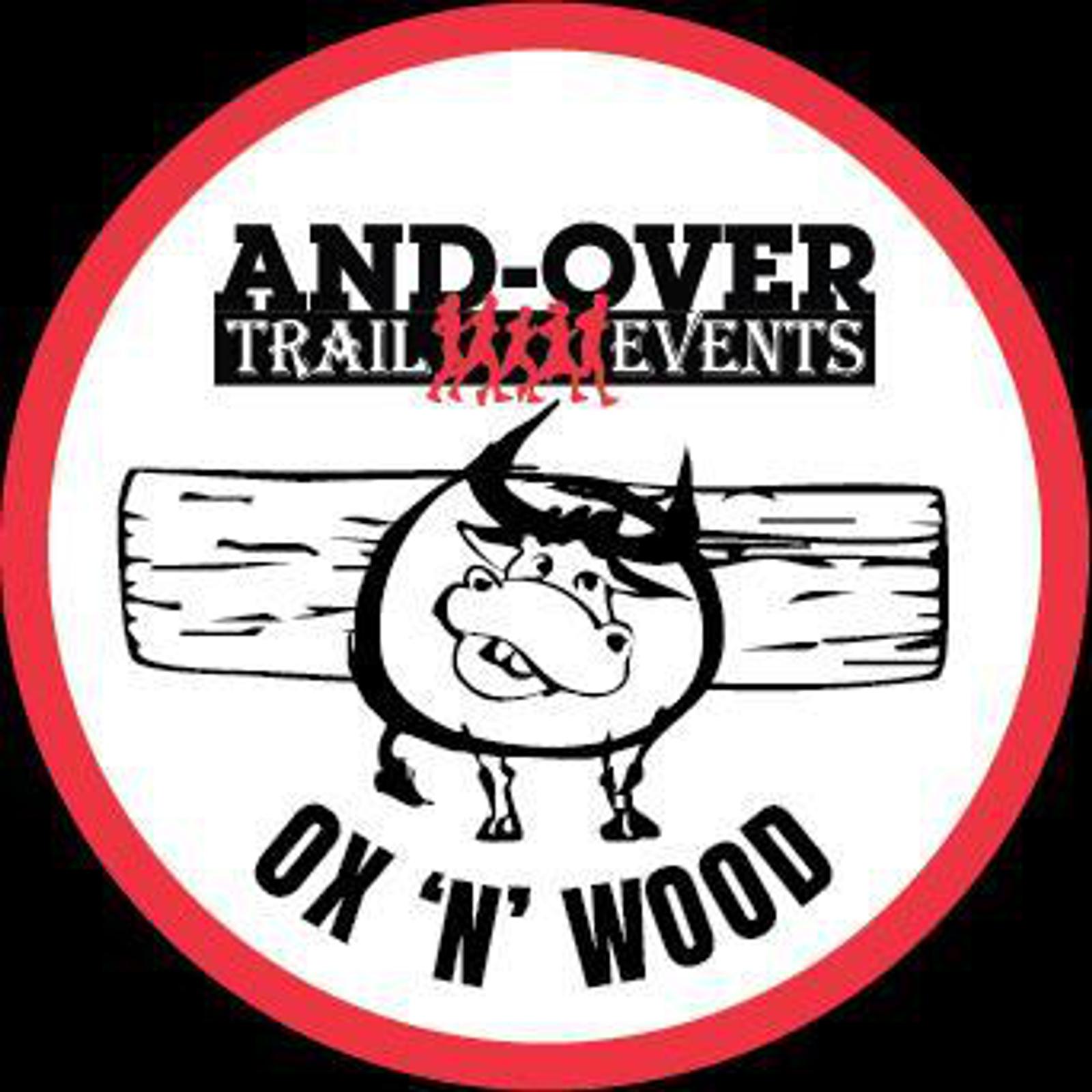 Logo for And-Over Trail Events titled "Ox 'N' Wood." It features a cartoon ox standing in front of a large wooden log, encircled by a red border.