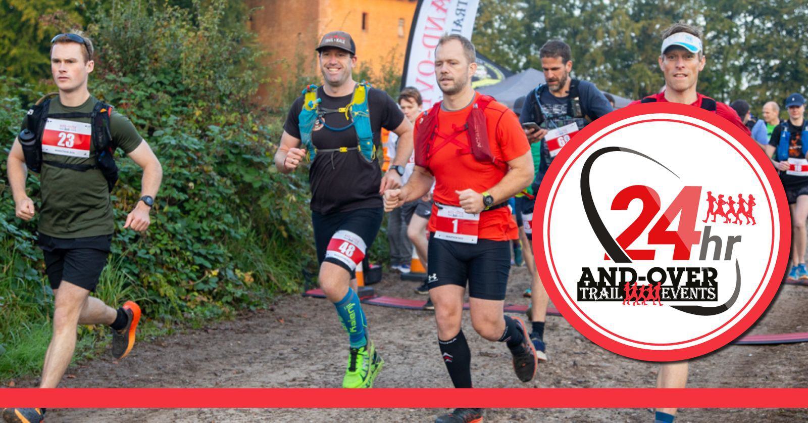 Runners participating in a trail event are jogging on a dirt path, surrounded by greenery. They wear numbered bibs and athletic gear. A logo on the right reads "24 hr Andover Trail Events.