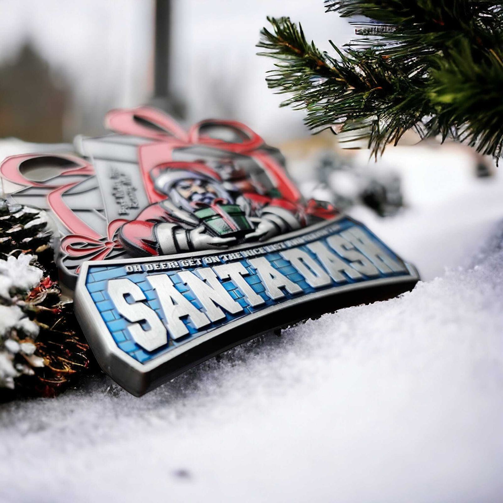 A "Santa Dash" medal featuring a Santa image and snowy background, surrounded by evergreen branches and pinecones.