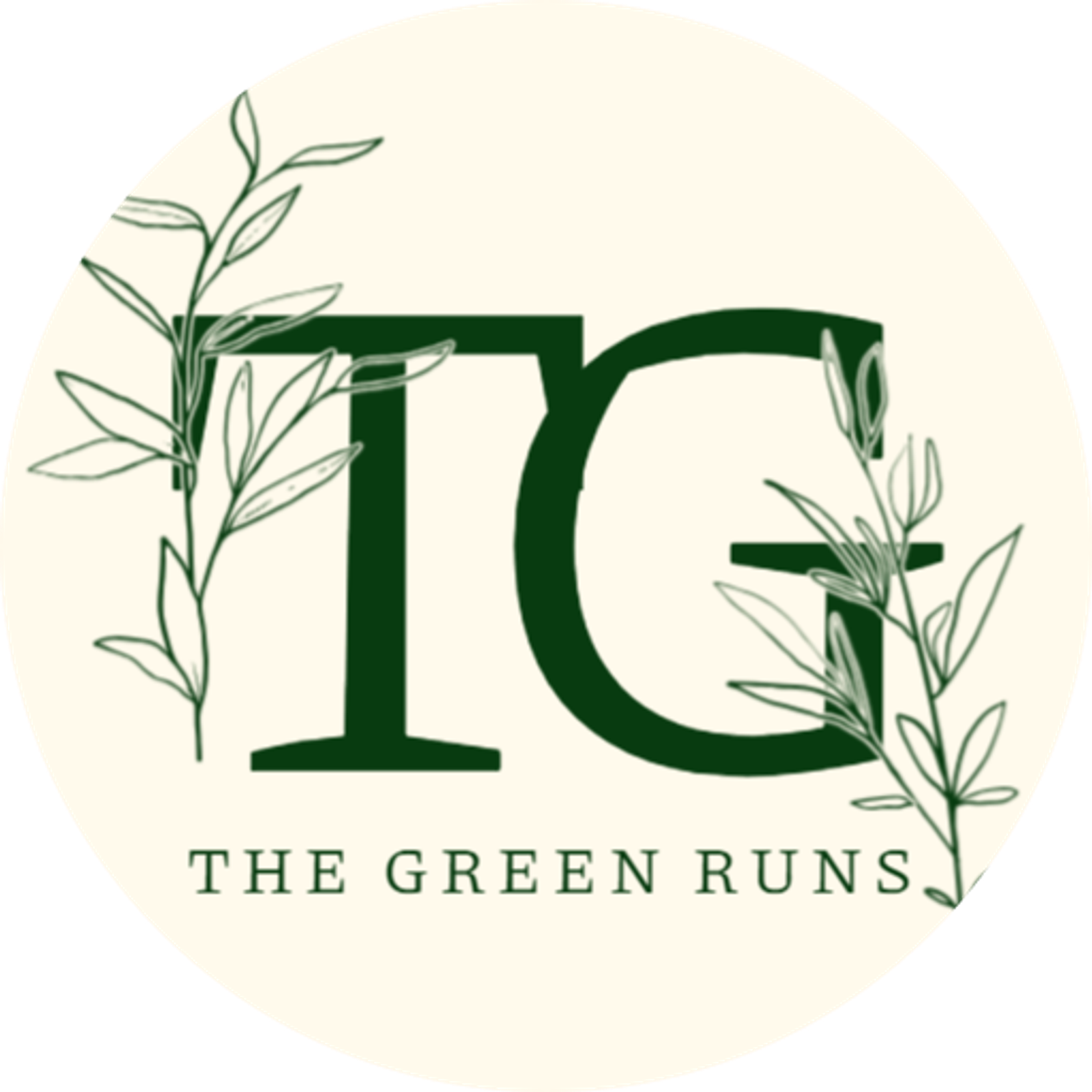 Logo with large dark green letters "TG" overlaid by simple green leafy branches; below, the text reads "THE GREEN RUNS" on a light beige circular background.